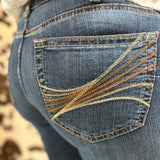 Close up view of the back pockets, tan, burnt orange, and light brown stitching.