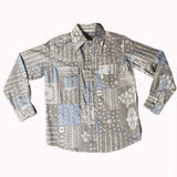 Flat lay of light grey long sleeve shirt with white and light blue Aztec and paisley bandana print.