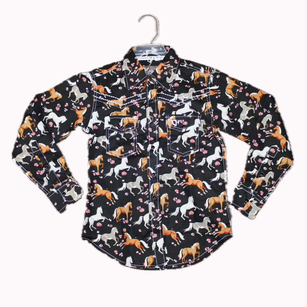 Flat lay of black long sleeve shirt with Palamino and Grey horses with pink flowers.