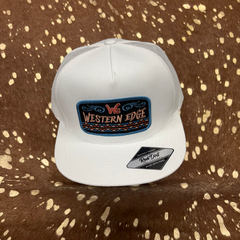 White trucker hat with large Western Edge scroll patch on the front.