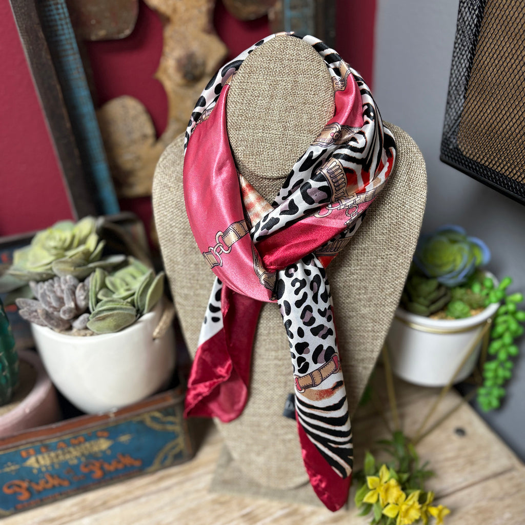 Red wild rag with zebra and leopard print designs. 