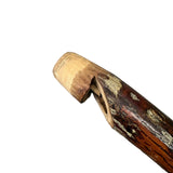 Close up view of the whistle end of the stick. 