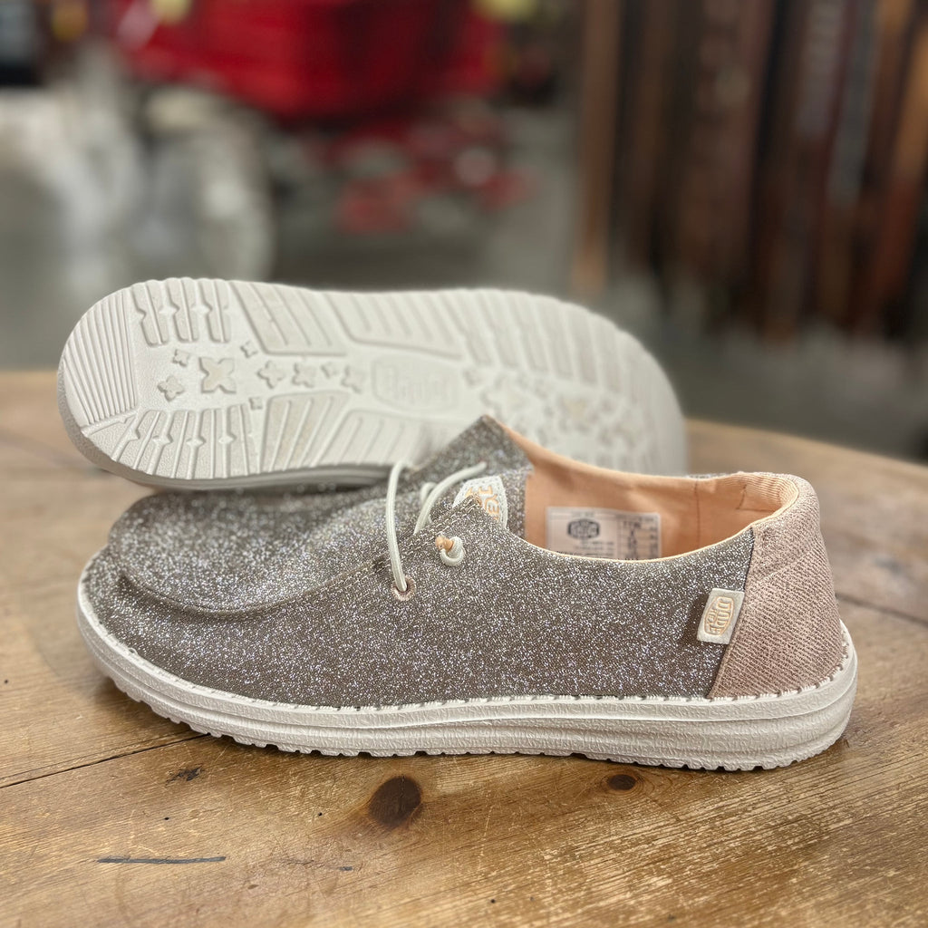 Side view and bottom side view of Wendy Rose Gold Shoes. 