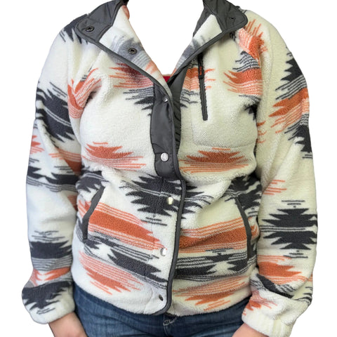 Front side view of cream, pink, and grey sherpa. 