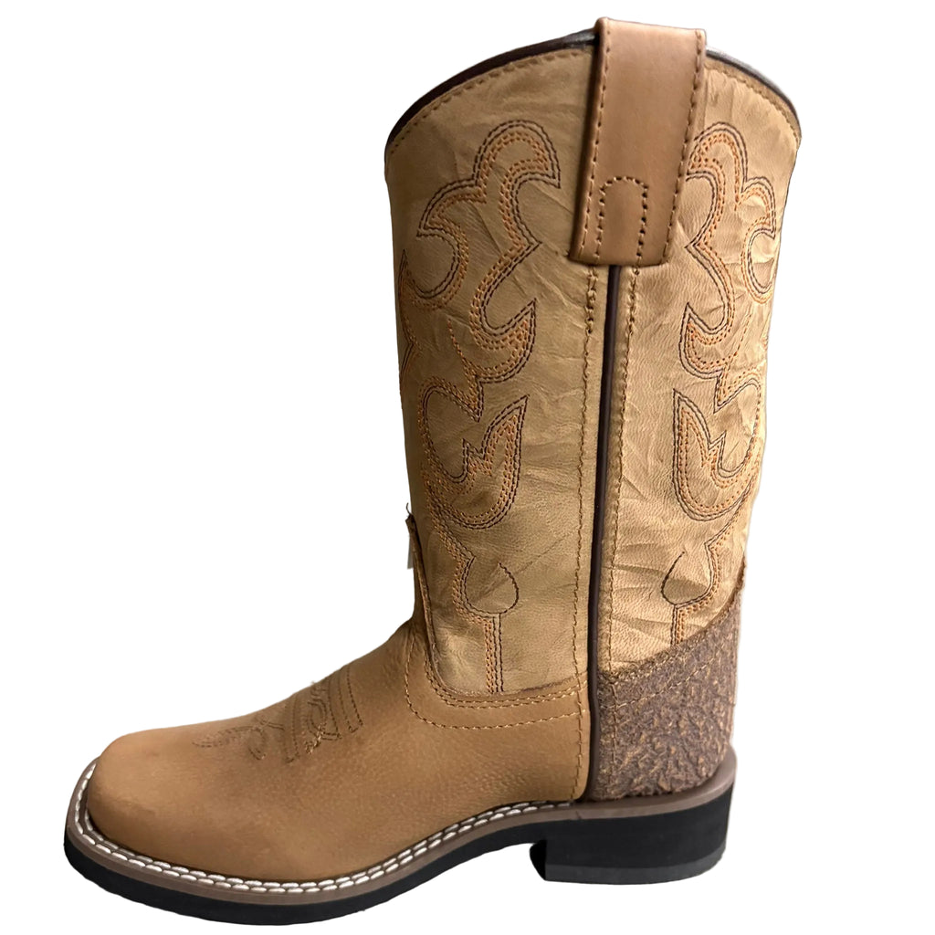 Side view of tan kid's boot. 