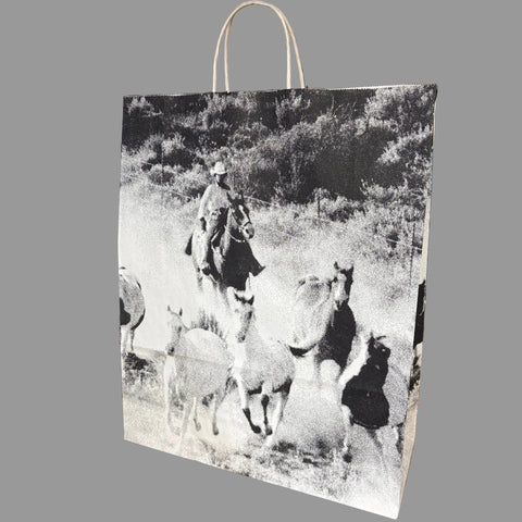 Front side view of standing western gift bag.