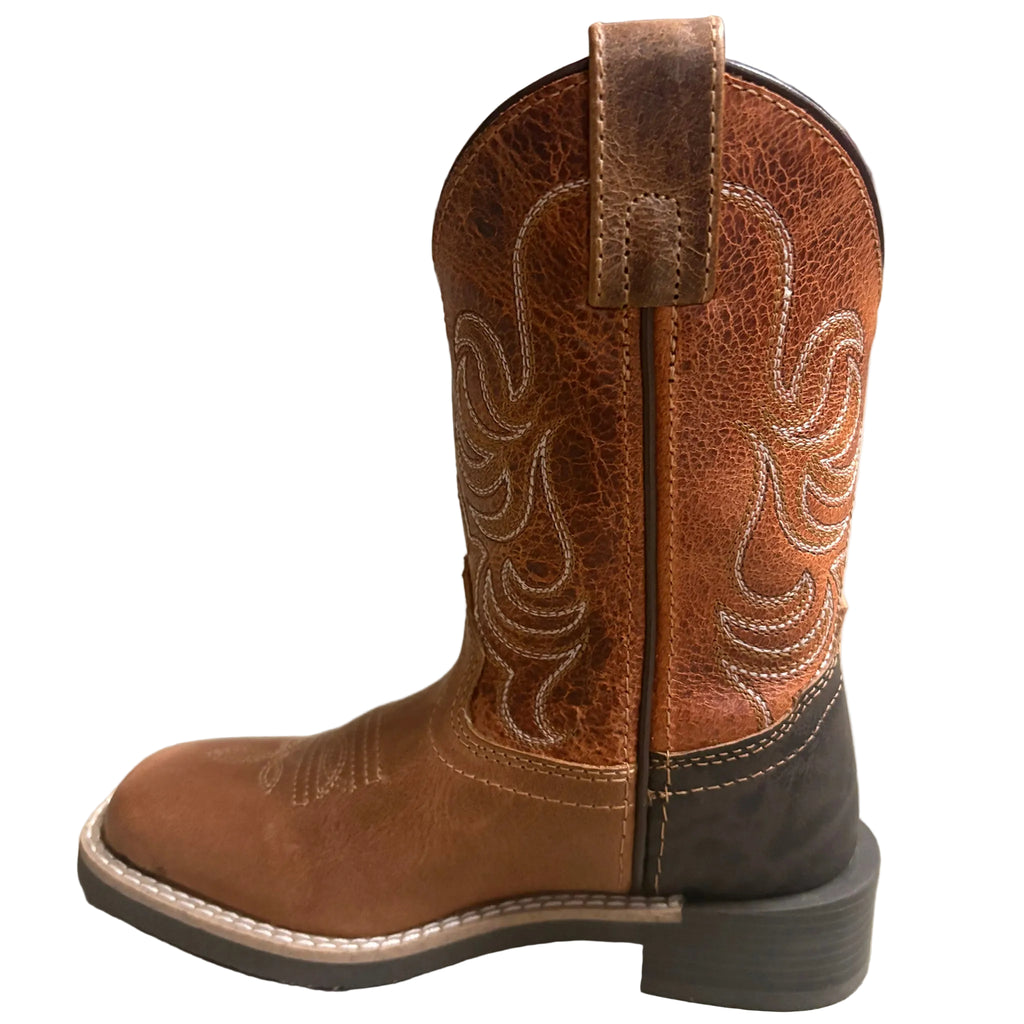 Side view of kids light brown boots.