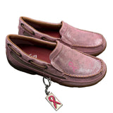 Side view of both pink Twisted X Moccasins with Twisted X keychain.