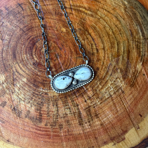 Close up view of the "Junie" 2 Stone White Buffalo Stone Bar Necklace 