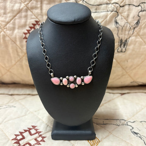 Close view of "Alma" 6 Stone Pink Conch Bar Necklace 