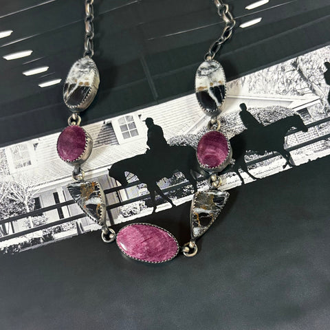 Close up view of the "Raven" White Buffalo & Purple Spiny Oyster Necklace 