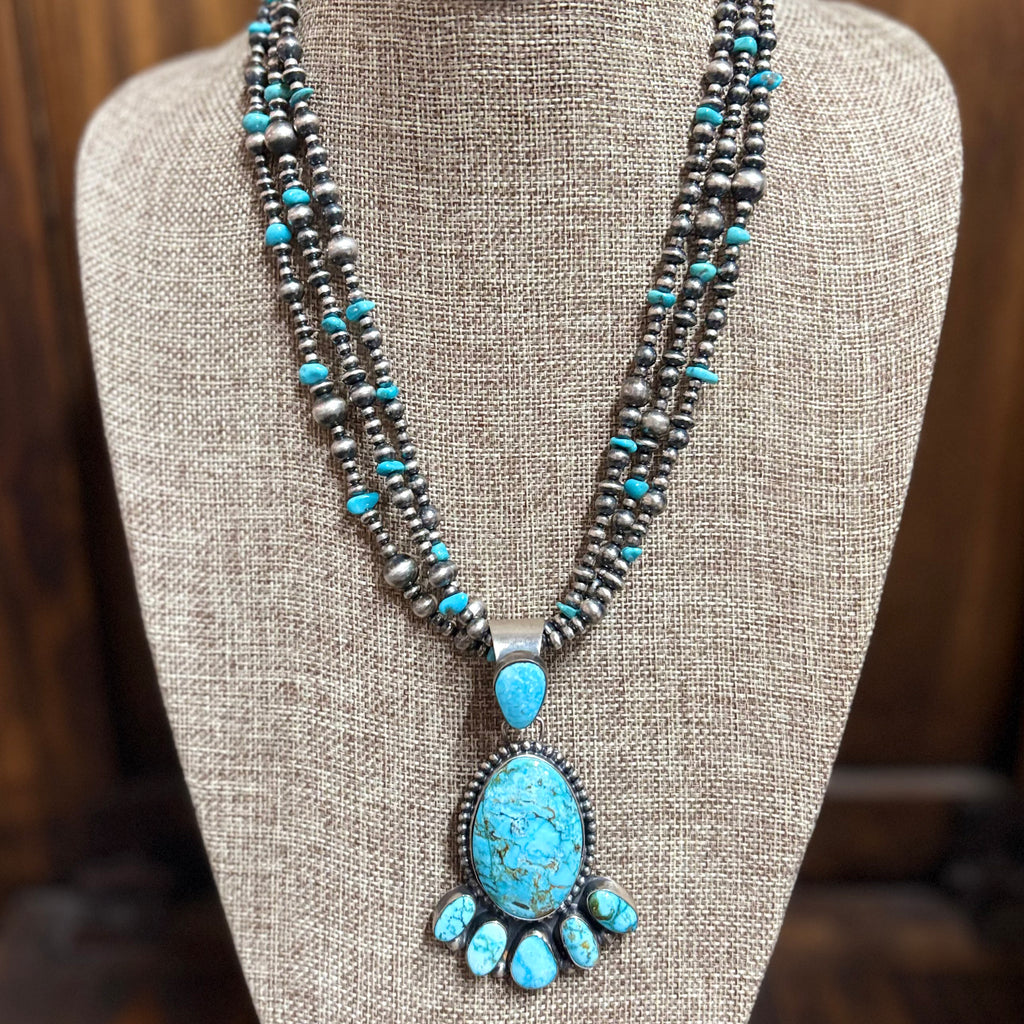 "Klein" 3 Strand Navajo Pearl & Turquoise Necklace sitting on mannequin.