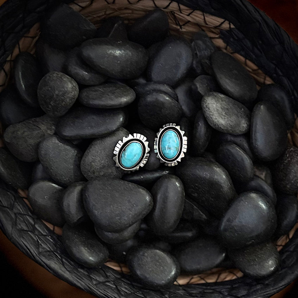 Close up view of the "Olly" Turquoise Oval Aztec Post Earrings 