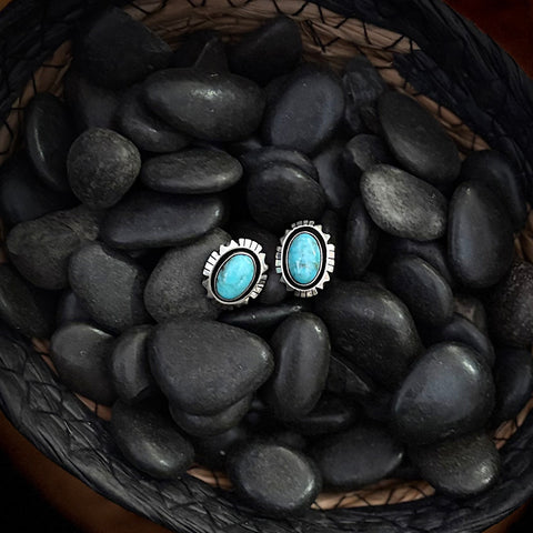 Close up view of the "Olly" Turquoise Oval Aztec Post Earrings 