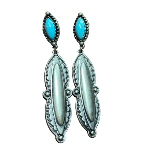 Close up view of Long Antiqued Silver Dangle Earrings with Turquoise Stone Post