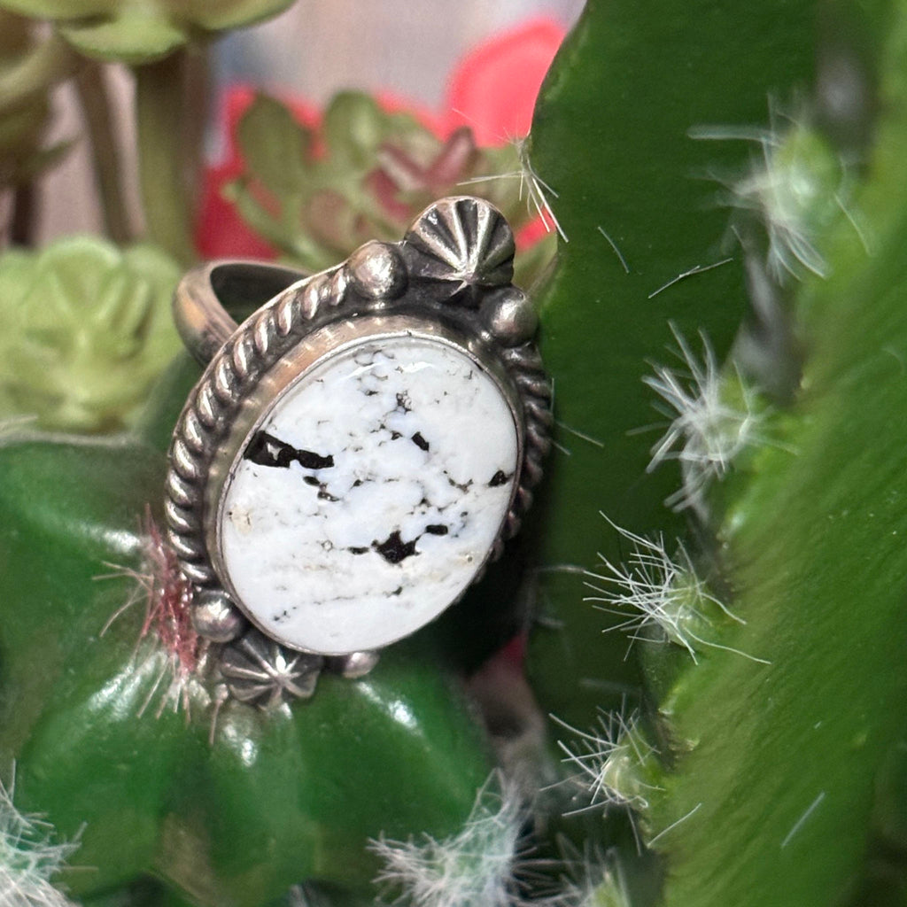 Close up of a white buffalo stone oval ring