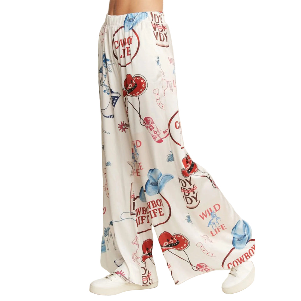 Wide-leg cream  pants with cowboy-themed print
