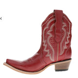 Side view facing left of red short cowboy bootie with white stitching.