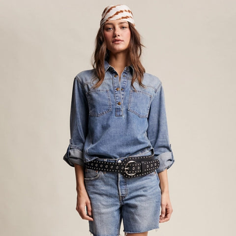 woman wearing a Western-Inspired Denim Popover Shirt with the sleeves rolled up