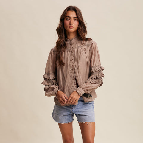 woman wearing a Lace Ruffle Sleeve Pintuck Blouse