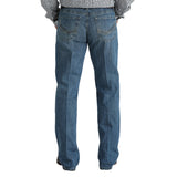 Man wearing the Cinch Men’s Grant Jean, back view showing the embroidered chevron‑patterned pockets and classic Cinch stitching.