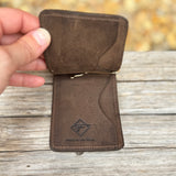 Inside of brown elephant money clip.