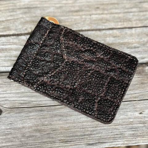Dark brown elephant money clip.
