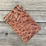 Light brown elephant card holder with money clip. 