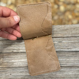 Inside of light brown elephant money clip.