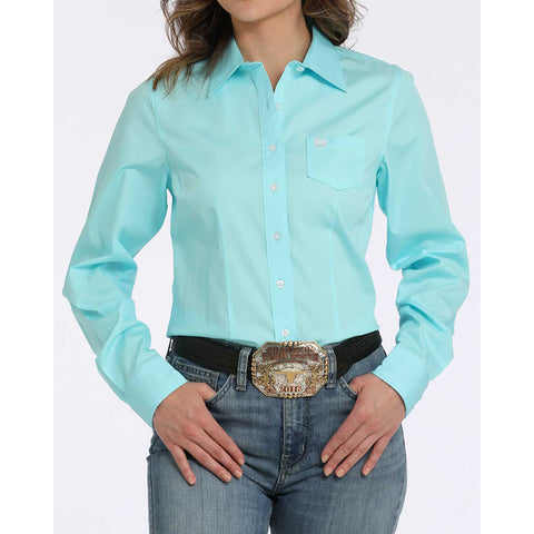 Turquoise long sleeve with white buttons and cinch logo.