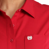 Close up view of the solid pink long sleeve. 