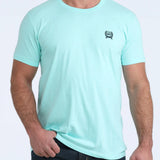 Front side view of the shirt, it has a small Cinch logo on the left chest. 