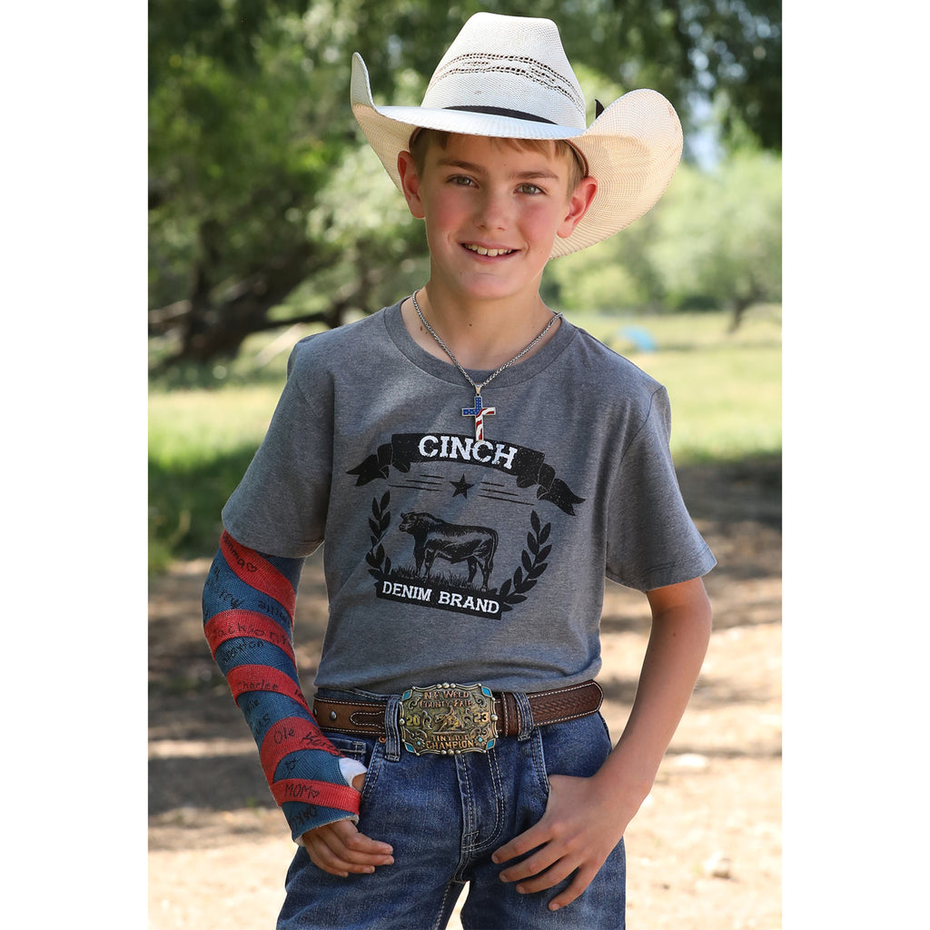 Front view of Cinch youth t-shirt featuring western bull graphic