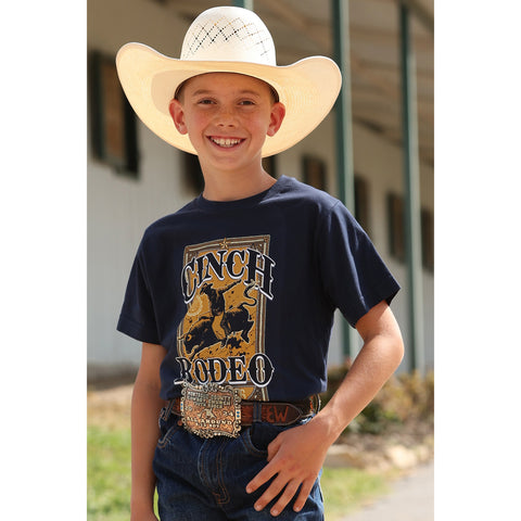 Youth wearing the Navy Cinch Rodeo Tee, front view showing the bold bull‑rider graphic and classic crew‑neck fit
