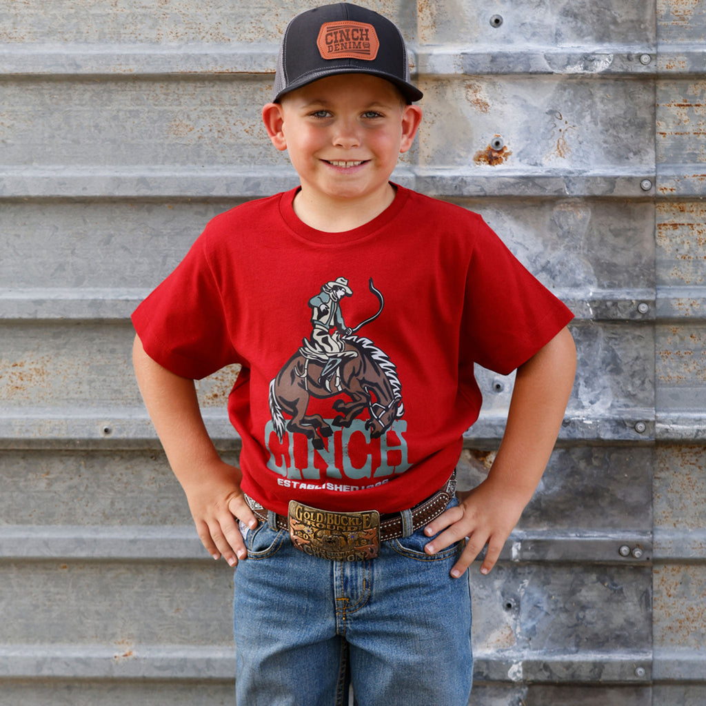 front facing boy model wearing red t shirt 