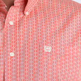 Close up view of the shirt design, it features a white embroidered Cinch logo on the chest pocket. 