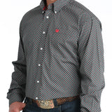 Black and red geometric print long sleeve button down shirt with white buttons. 