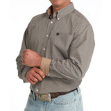 Side view of model wearing the Cinch Khaki Geo Print Long Sleeve Shirt, highlighting contrast cuff.