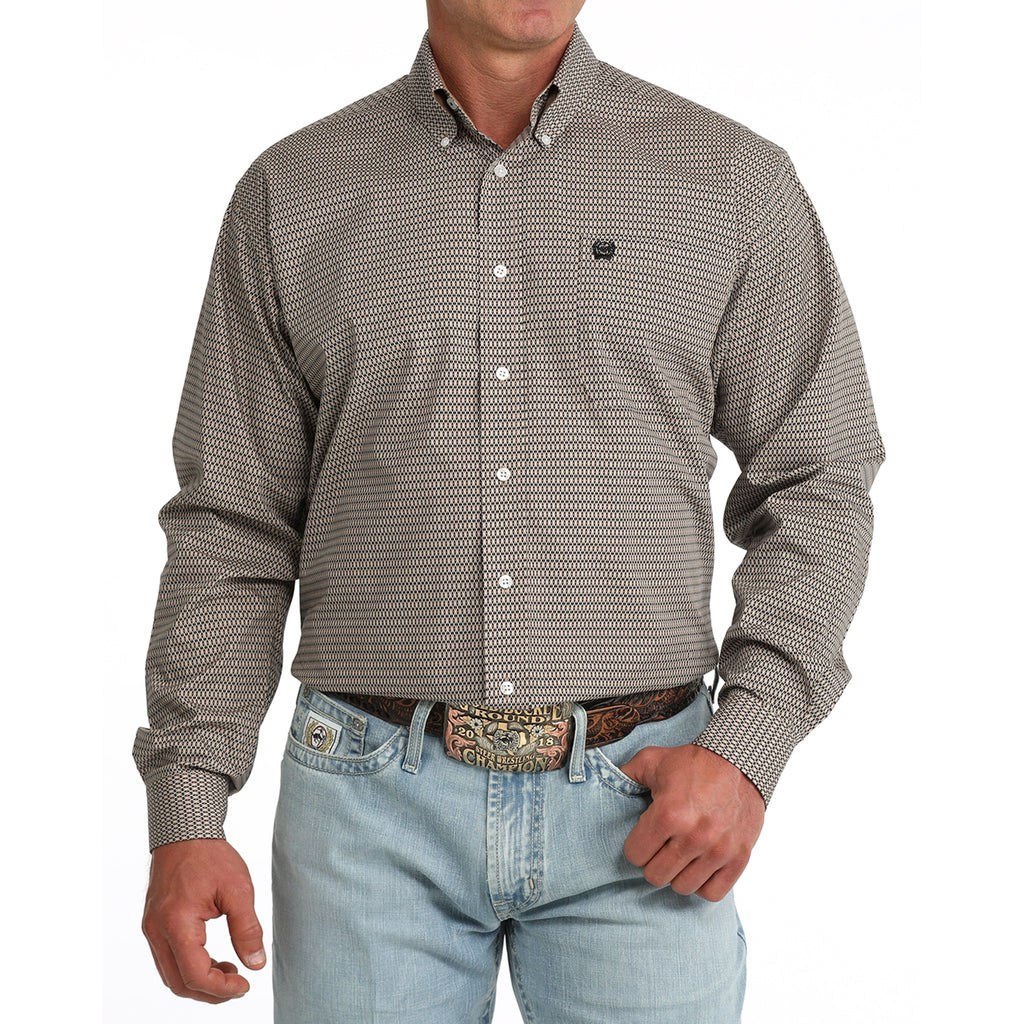 Model wearing the Cinch Men’s Khaki Geo Print Long Sleeve Button-Up, showing the subtle geo pattern and classic Western fit.