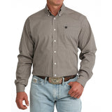 Model wearing the Cinch Men’s Khaki Geo Print Long Sleeve Button-Up, showing the subtle geo pattern and classic Western fit.