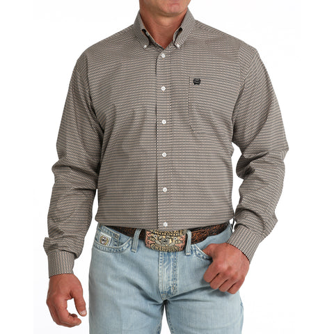 Model wearing the Cinch Men’s Khaki Geo Print Long Sleeve Button-Up, showing the subtle geo pattern and classic Western fit.