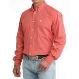 Side view of model wearing the Cinch Red Geo Print Striped Button-Up, highlighting sleeve detail and relaxed Western silhouette.