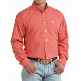 Model turned to the side in Cinch Men’s Red Geo Print Striped Shirt, showing pattern and fit.