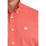 Close-up of model wearing the Cinch Red Geo Print Striped Button-Up, focusing on collar, buttons, and geometric pattern.