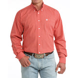 Model wearing the Cinch Men’s Red Geo Print Striped Button-Up, showing bold red pattern and classic Western fit.