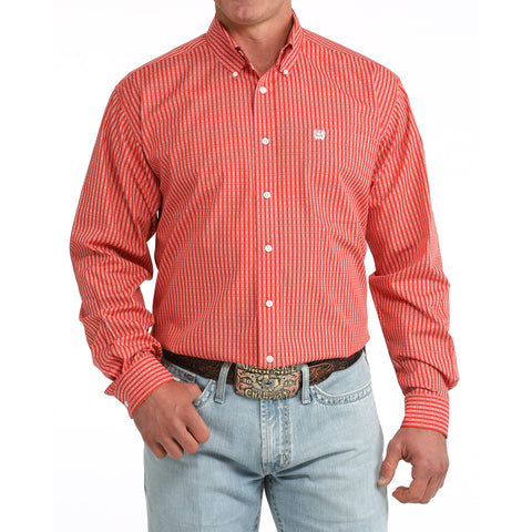 Model wearing the Cinch Men’s Red Geo Print Striped Button-Up, showing bold red pattern and classic Western fit.