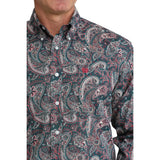 Close‑up of model in the Cinch Men’s Paisley Long Sleeve Teal Shirt focusing on the collar, buttons, and intricate teal paisley detail.