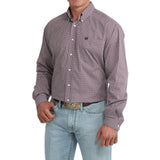 Side view of model in Cinch Men’s Purple Geo Print Shirt, highlighting sleeve detail, tailored silhouette, and purple geo design.