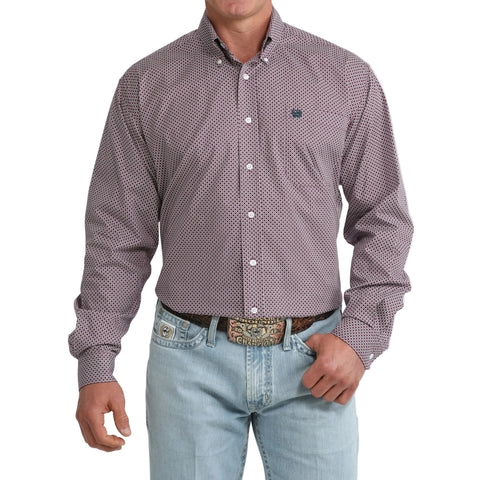 Model wearing the Cinch Men’s Purple Geo Print Long Sleeve Shirt, showing the bold geometric pattern and classic Western button‑down fit.
