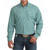 Male model wearing the Cinch Men’s Blue Printed ArenaFlex Shirt, front view.